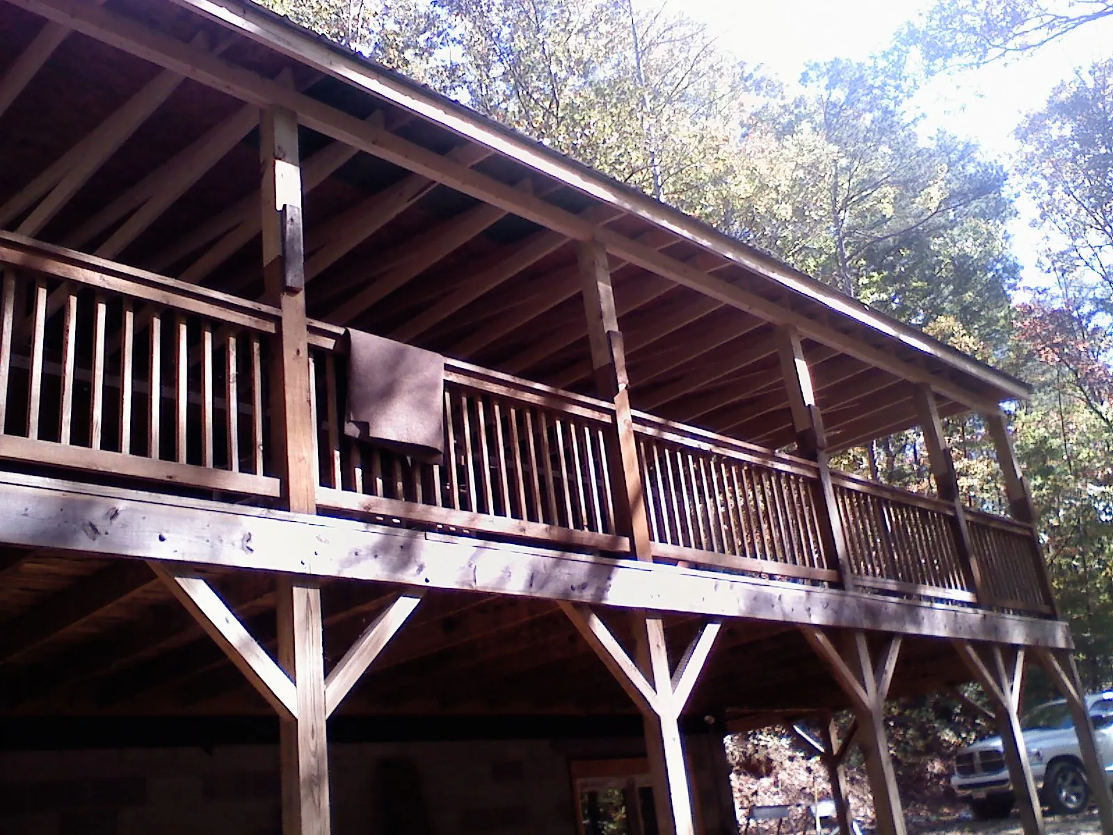 Timber framing under a new elevated porch and deck — Roof Leak Repair in Bentonia by Roofing Brothers